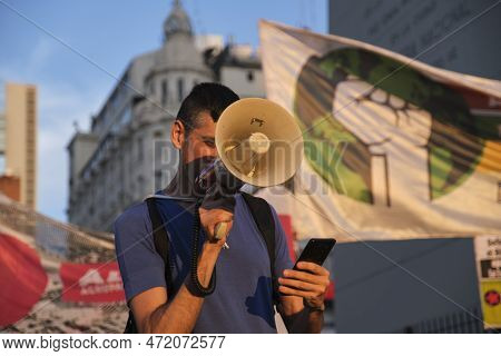 Buenos Aires, Argentina; March 3, 2023: Activist With A Megaphone During The Global Climate Strike, 
