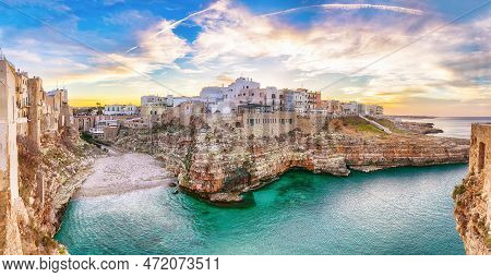Stunning Sunset At Cala Paura Gulf With Bastione Di Santo Stefano And Lama Monachile Beach In Backgr
