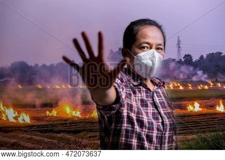 Woman Raises Her Hand To Stop Burning In Agriculture To Reduce Pm 2.5 Dust. Fumes Produced By Incine