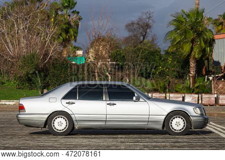 Side, Turkey -january 27, 2023:   Silver Mercedes  W140   Is Parked  On The Street On A Warm Day