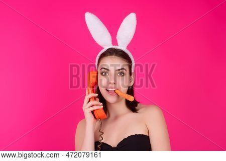 Portrait Of A Cheerful Pretty Young Girl Celebrating Easter Isolated Over Studio Background. Studio 