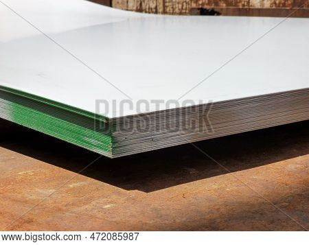 Selective Focus Image With Noise Effect A Bunch Of Electro Galvanized Sheet Metal Stacked Together O