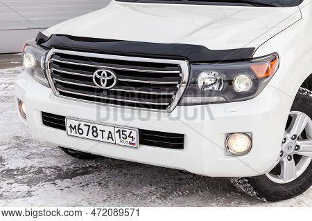 Novosibirsk, Russia - 04.03.2023: Front View Of Toyota Land Cruiser 200 J200 2013 Year White Color A