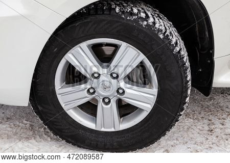 Novosibirsk, Russia - 04.03.2023: View On Rims Of Toyota Land Cruiser 200 J200 2013 Year White Color