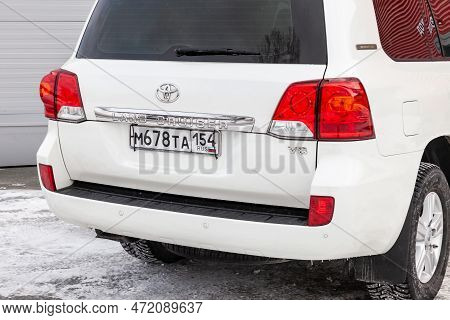 Novosibirsk, Russia - 04.03.2023: Rear View Of Toyota Land Cruiser 200 J200 2013 Year White Color Af