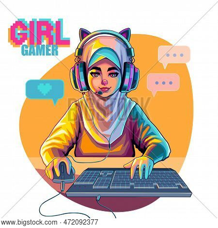 Muslim Girl Gamer Or Streamer With Cat Ears Headset Sits In Front Of A Computer