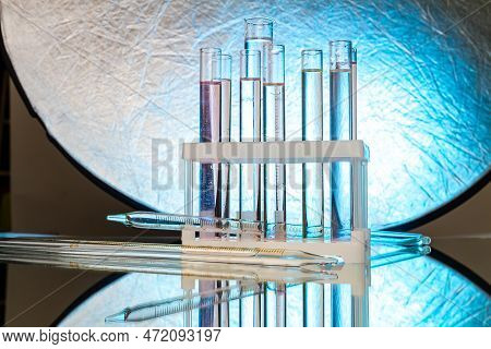 Set Of Lab Test Tubes Filled With Transparent Liquid. Lab Equipment For Medicine Reserarch.