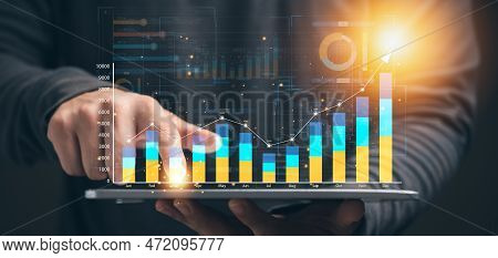 Businessman Analyzing Business Enterprise Data Management, Business Analytics With Charts, Metrics A