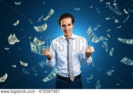Finance Freedom, Money, Wealth And Success Concept With Powerful And Happy Man On Dark Blue Backgrou
