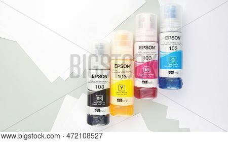 Four Bottles Of Ink Epson, Yellow, Red, Blue, Black, Built-in To The Epson L3150 Series Printer.