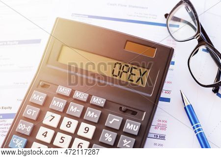 The Text Opexon Calculator Screen, Business Concept. Opex Stands For Operational Expenditure.