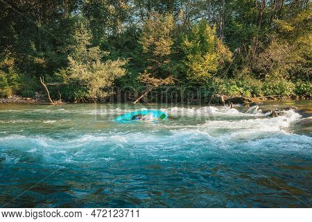 Kayaker Capsized Into The River While Paddling. Flip And Turn In A Kayak.