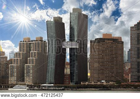 Manhattan Cityscape With American Copper Buildings In Background. Bright Sunny Day