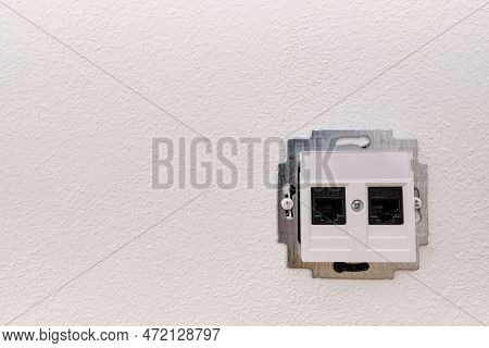 Installing Or Repairing On-wall Internet Network Socket For A Computer, Cat.5e, Open During, Black C
