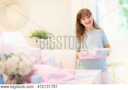 Kids Birthday Party. Child Blowing Out Cake Candle