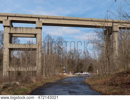 The Paved Walking Trail In The Bridges To The Past Area In Radcliff, Kentucky, Usa With A Train Over