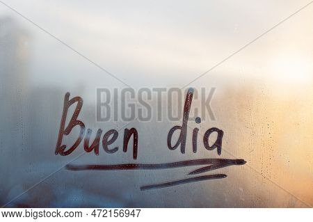 Handwritten Message Lettering Buen Dia In Spanish Language Is Good Day In English On Misted Glass On