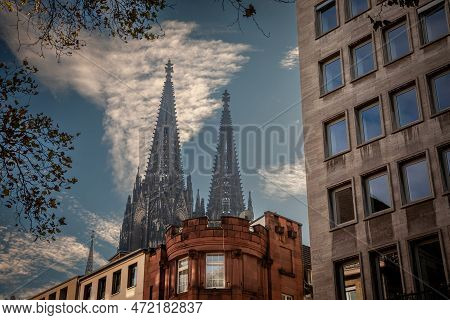 Cologne Cathedral With A Residential Apartment Building In Front With Blue Sky. Cologne Cathedral, O