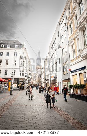 Bonn, Germany - November 7, 2022: Crowd Of People Walking By Stores And Shops In Remigiusstrasse Str