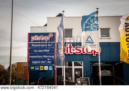 Aachen, Germany - November 8, 2022: Logo Of Pitstop Germany On Their Garage In Aachen. Pitstop Is A 