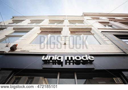 Maastricht, Netherlands - November 10, 2022: Selective Blur On A Uniq Mode Logo In Front Of Their Sh