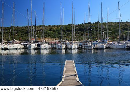 Primosten, Croatia - July 15, 2021: Sailboats Moored In Primosten Marina In Dalmatia. Croatia Is A F