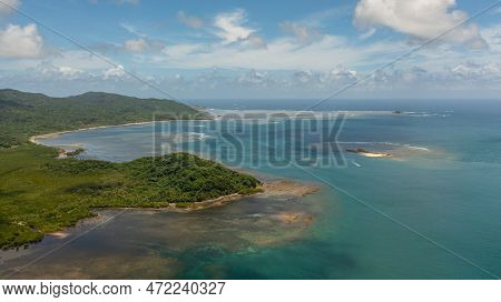 Seascape With Tropical Island And Blue Ocean. Luzon, Santa Ana, Cagayan. Philippines.