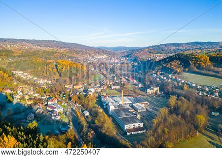 The Village Of Plavy Situated In A Sunny Autumn Hilly Landscape, Czech Republic. Aerial View From A 