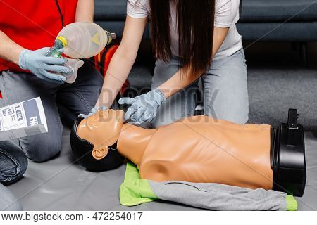 Woman Holding Breathing Bag Ambu Bag.demonstrating Cpr Cardiopulmonary Resuscitation Training Medica