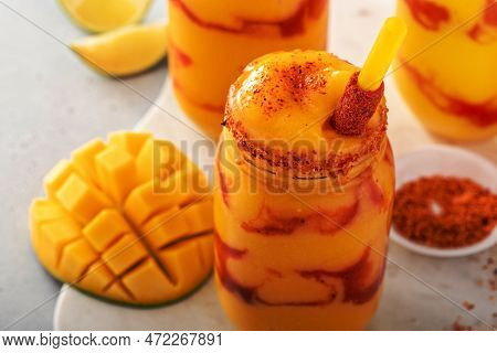 Mangonada Mexican Mango Smoothie With Chamoy Sauce And Lime Seasoning