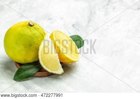 Bergamot. Fresh Bergamot Fruit, Kaffir Lime, Citrus Bergamia. On A Light Background. Banner, Menu, R