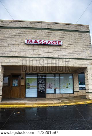 Stone Mountain, Ga Usa - 05 27 20: View Of Aa Massage Parlor Business Sign And Entrance After A Rain