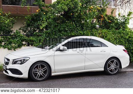 Side, Turkey -january 29, 2023:      White Mercedes-benz Cla-class  Is Parking  On The Street On A  