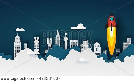 Spaceship Or Rocket Launch Into The Sky Over Buildings In City Scape View On Night Sky Background An