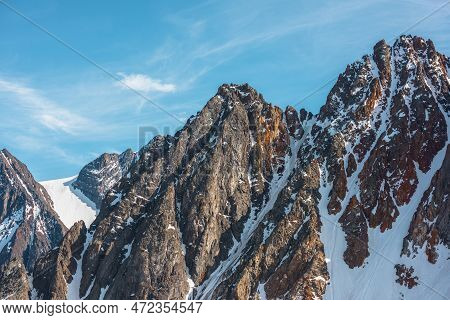 Scenic Alpine Landscape With Snowy Mountain Peak In Sunny Day. Awesome Landscape With Rocky Pinnacle