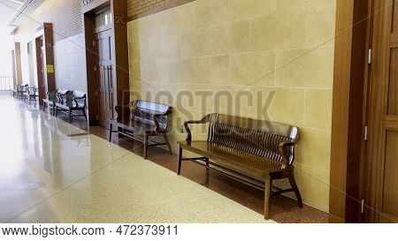 Augusta, Ga Usa - 01 26 23: Richmond County Courthouse Wooden Benches By Wall