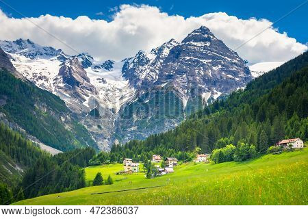 Idyllic Village In Stelvio Pass Valley And Ortler Massif, Italian Dolomites At Springtime, Italy