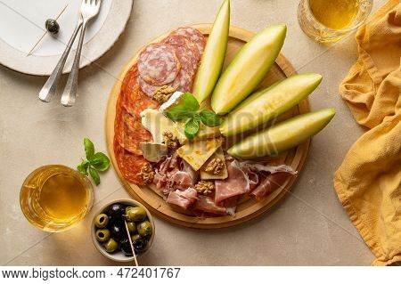 Charcuterie Gourmet Antipasti Plater Cheese, Salami, Prosciutto, Melon Board. Top View