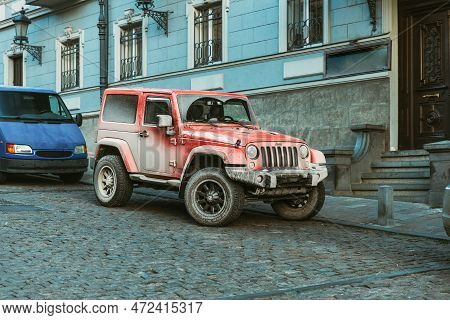 Tbilisi, Georgia - March 28, 2022: View Of Red Jeep Wrangler Overland Edition Parked By Street Of Tb