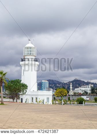 Lighthouse Is Now Defunct. Embankment In Batumi. Beautiful Architecture By The Sea. White Lighthouse