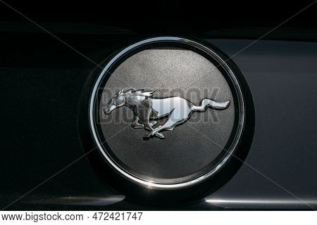 Dubai, Uae, United Arab Emirates - May 25, 2021: Close Up Of Logo Logotype Sign Of Ford Mustang On H