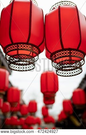 Red Chinese Lanterns Hanging In A Street, Luodai, Chengdu, Sichuan Province, China