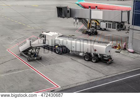 Aircraft Refueling Machine At Boryspil International Airport In Kyiv, Ukraine. Ladder, Truck And Oth