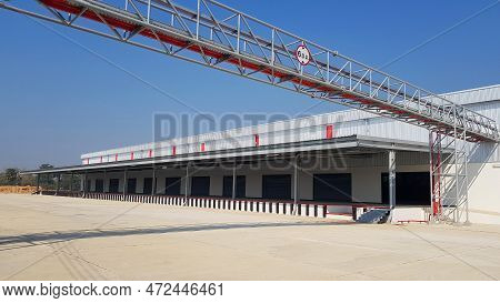 Cargo Or Warehouse For Storage And Transport Of Many Parcels Or Shipping By Mail With Clear Blue Sky
