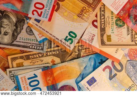 Multicurrency Background Of Us Dollars, Euros And Swiss Francs