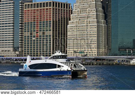 New York City - February 14, 2023: View To Manhattan Downtown And Nyc Ferry From Brooklyn Waterfront