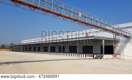 Cargo Or Warehouse For Storage And Transport Of Many Parcels Or Shipping By Mail With Clear Blue Sky