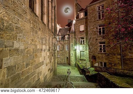Saint-malo At Night (with The Moon)-- Is A Walled Port City In Brittany In Northwestern France On Th
