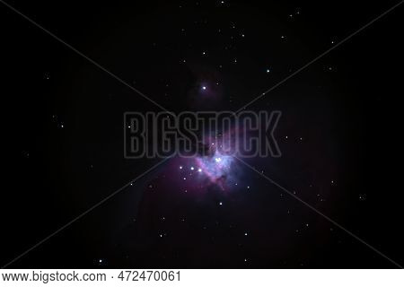 Night Sky Background With Bright Orion Nebula On Black Sky With Stars. Astro Photo On Winter Night W