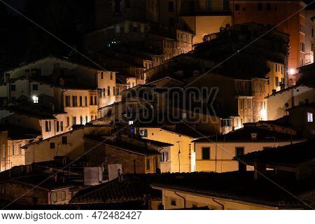 Houses In Siena, Italy In The Bruco Distric At Night